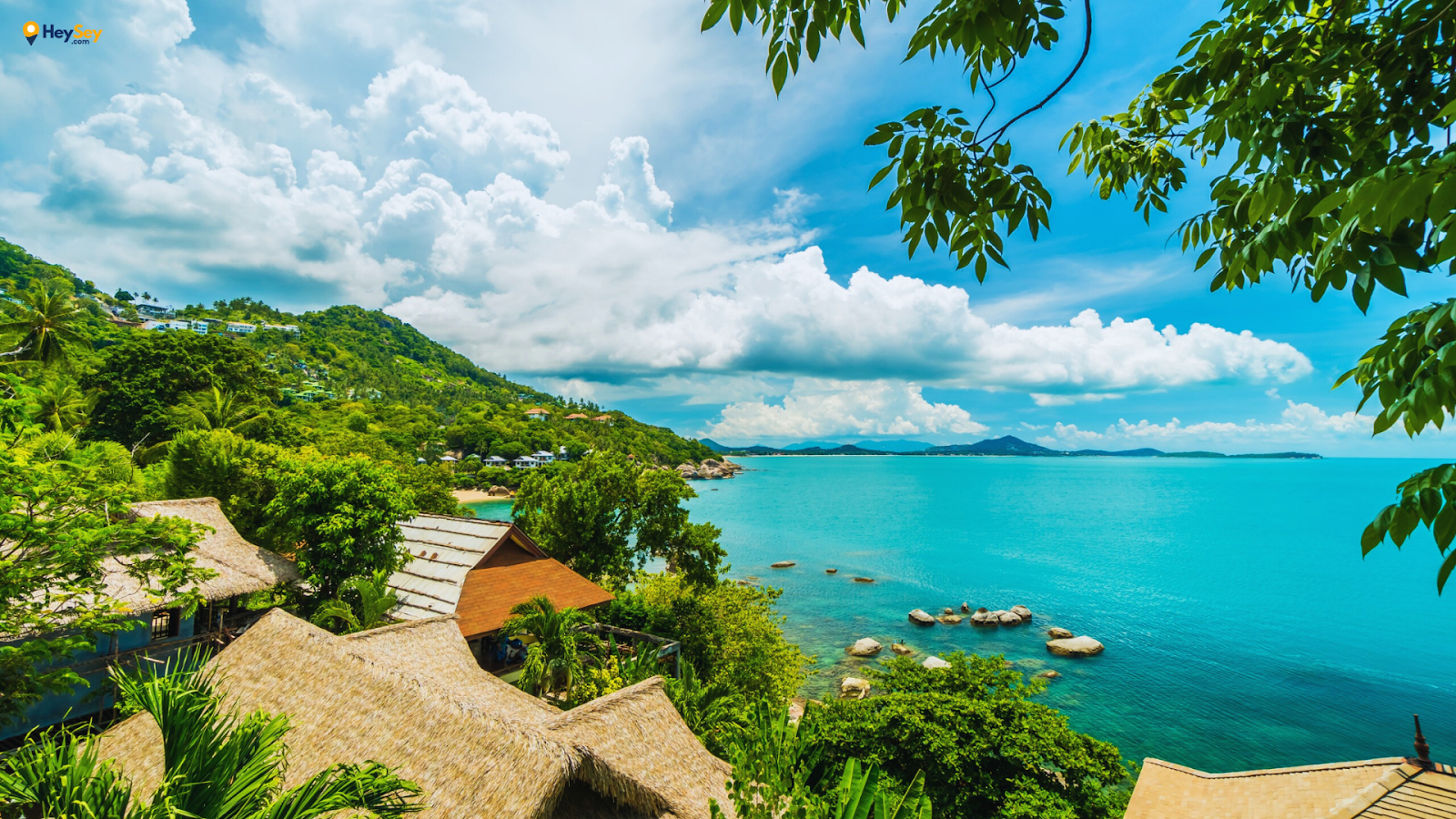 Aerial view of Mahé Island Seychelles showing turquoise coastline, granite boulders and tropical forest landscape